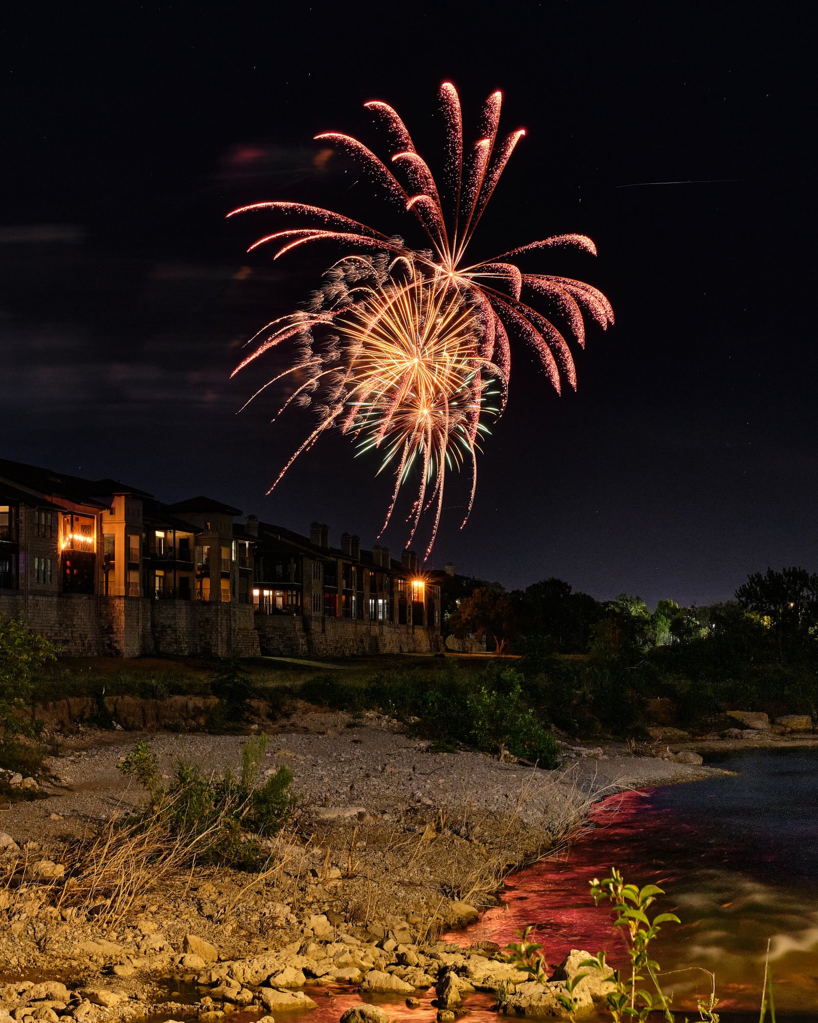 Here’s another 4th of July fireworks photo. 

Fireworks photography, for me, is extreme. Mainly because I only do it once a year. There’s a lot you can do to prep for the shoot. 
Location is key. I wanted an unobstructed view that still had a good foreground for context. 
Choosing the right lens. I used my Meike 33mm f1.4. With the distance that I was from the fireworks, this allowed me to get everything in my image. I figured worse case I can always crop. 
Settings, I used ISO200 at f8. What I played with while shooting was my shutter speed. It varied between 4sec. up to 13sec. It was all a guessing game. 
To be honest, looking at the images on my camera while I was shooting, I wasn’t sure if I got any good shots or not. It wasn’t till I got them on the computer screen did I find relief. They came out okay. 

#fireworks #fujifilm_xseries #georgetownsertoma #georgetowntx #meike33mmf14